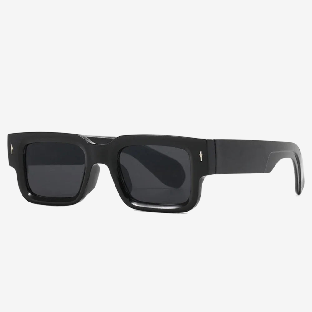 a pair of black sunglasses on a white background