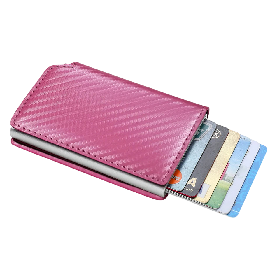 a pink leather wallet with credit cards in it