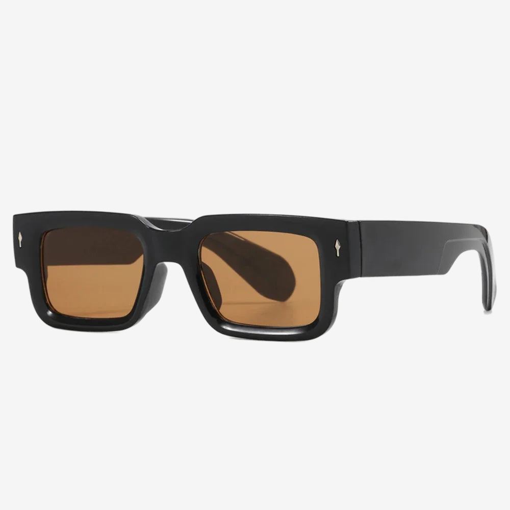 a pair of black sunglasses with a brown lens