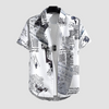 a white shirt with newspaper print on it