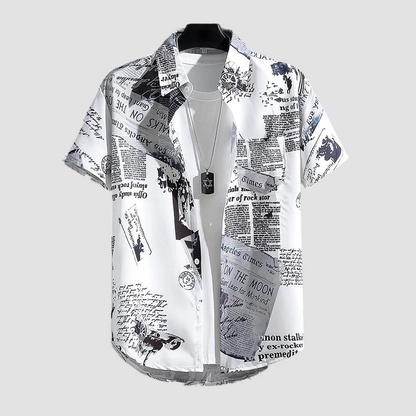 a white shirt with newspaper print on it