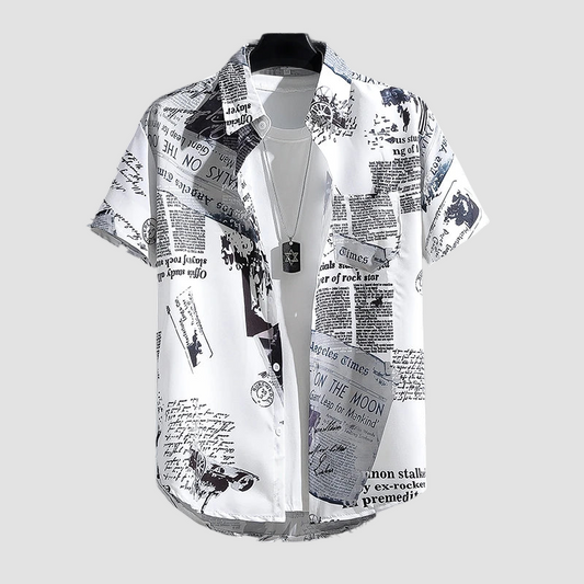 a white shirt with newspaper print on it