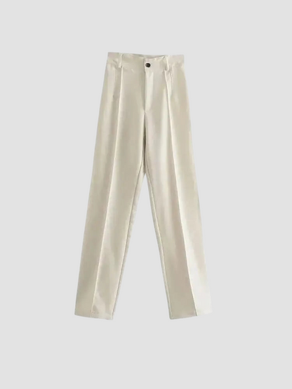 a pair of white pants hanging on a hanger