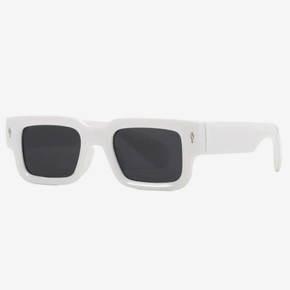 a pair of white sunglasses with black lenses