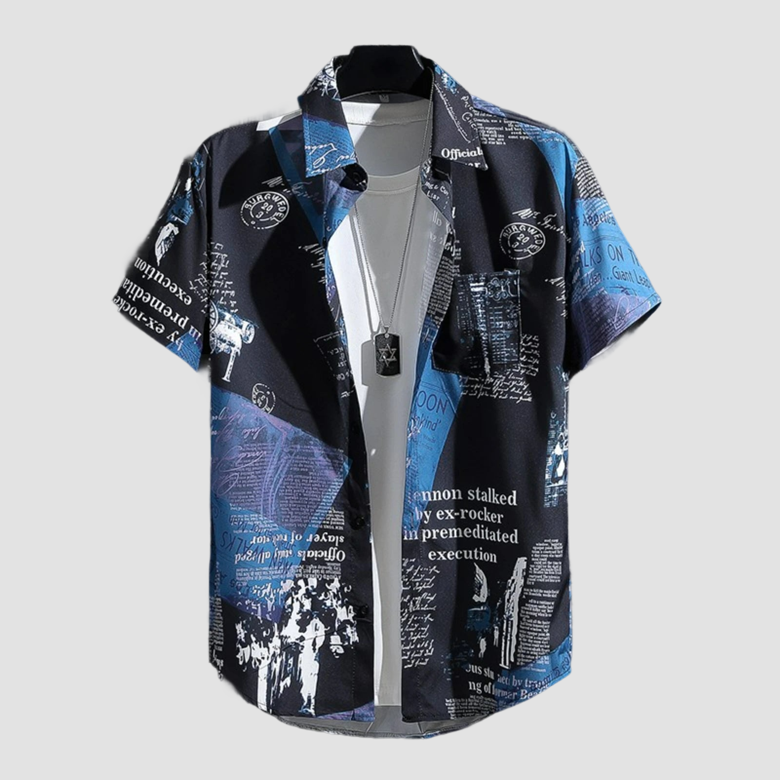 a blue shirt with black and white designs on it